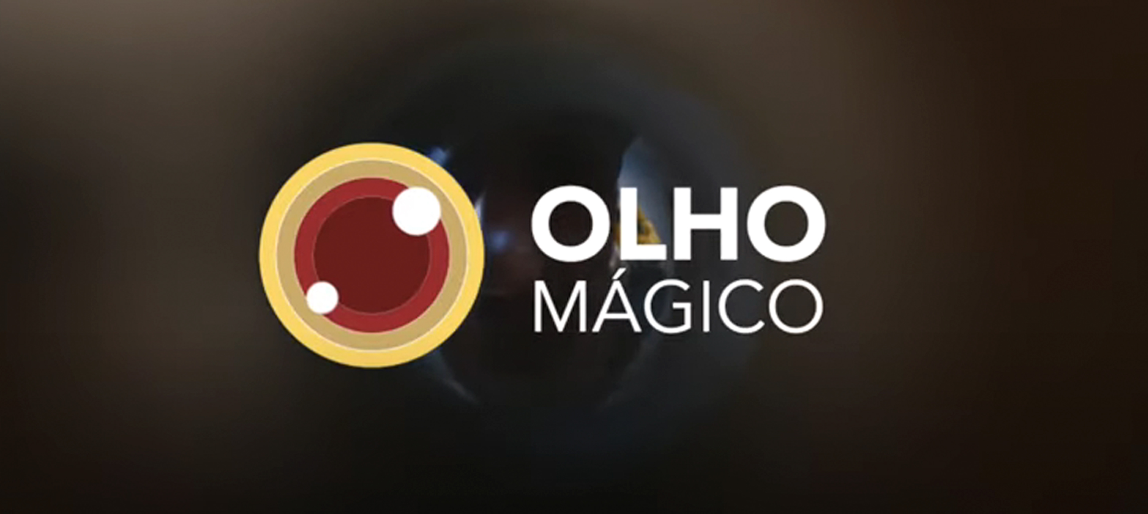 Logotipo do Olho Mágico, canal exclusivo da Manager para denúncias seguras e anônimas, com design circular em tons de vermelho e dourado.